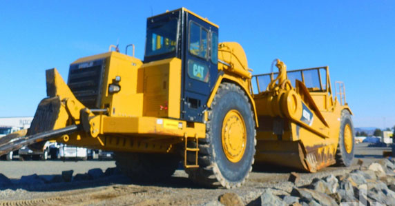 Cat motor scrapers sold by Ritchie Bros. Cat motor scrapers sold by Ritchie Bros.